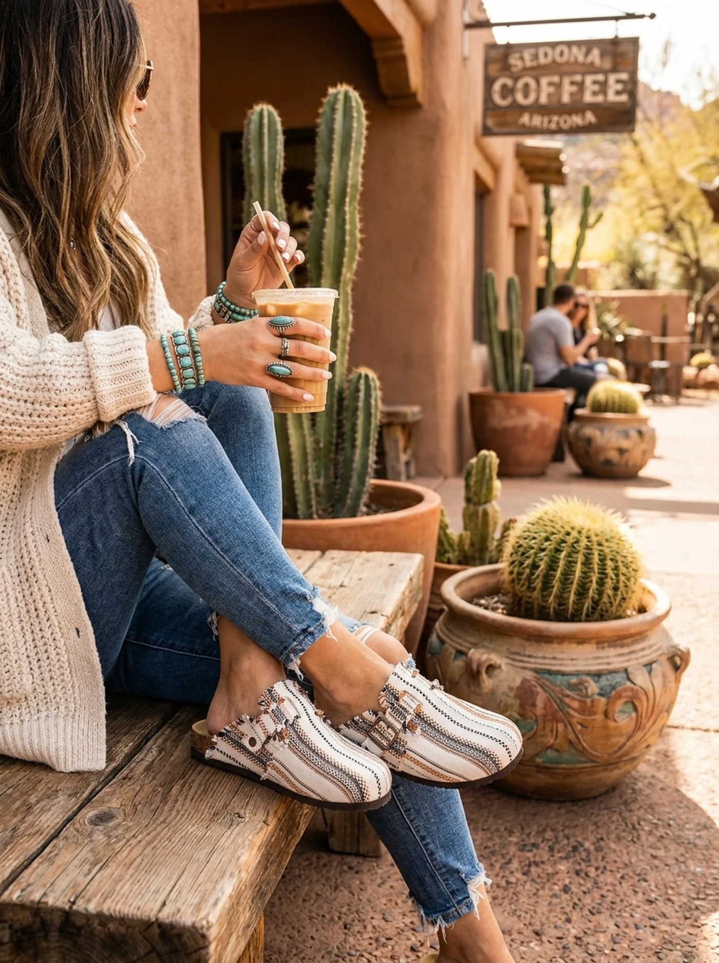 The Sunday Mule by STILL. in Dune Stripe — woven striped canvas buckled clog in soft daylight.