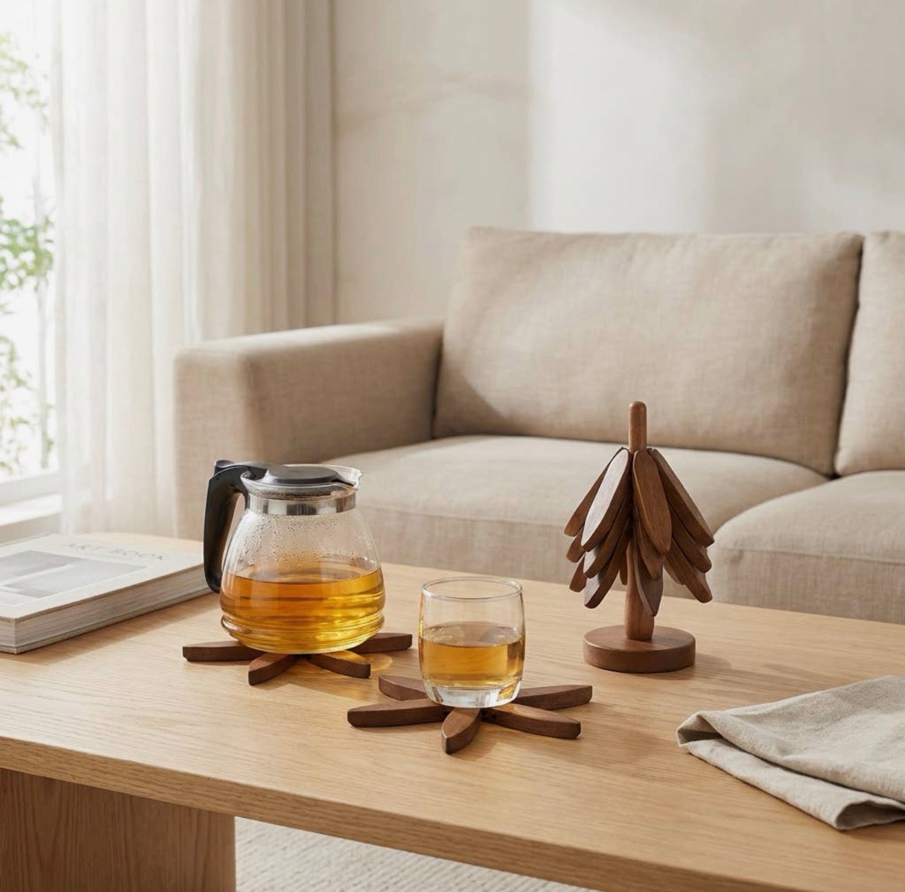 The Grove in Evening on a coffee table, one coaster resting under a glass teapot.